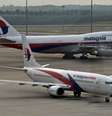 <p>Mesmo se a Malaysia Airlines garantir uma nova fonte de financiamento, permanecerão dúvidas sobre sua viabilidade no longo prazo</p>  Foto: Tomas Manan Vatsyayana / AFP