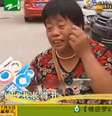 Ding Liang em entrevista para canal de TV da China; seu filho a impediu de ver seu neto por achá-la "muito feia"  Foto: Reprodução / Daily Mail
