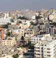 <p>Fumaça é vista próximo ao hospital atingido pela ofensiva israelense em Gaza, em 28 de julho</p>  Foto: Twitter