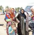 Famílias deixam a cidade iraquiana de Mossul em 24 de julho  Foto: Stringer  / Reuters