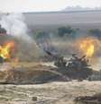 Uma unidade de artilharia móvel israelense dispara contra a Faixa de Gaza nesta segunda-feira.  Foto: Baz Ratner / Reuters