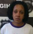 Cristiane Tavares de Souza, 32 anos, foi presa em Goiás por agredir um homem até a morte com pedras, garfos e facas    Foto: Polícia Civil de GO / Divulgação