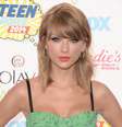 Neste domingo (10), muitos famosos marcaram presença no Teen Choice Awards, nos Estados Unidos. Na foto, Taylor Swift   Foto: Jason Merritt / Getty Images 