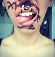 <p>As pinturas ao redor dos lábios ganham ar realista</p>  Foto: Laura Jenkinson Makeup Artist/Facebook / Reprodução