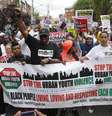 <p>Milhares marcharam nas ruas de Staten Island, Nova York, em protesto contra a morte por policiais de dois homens negros</p>  Foto: Shannon Stapleton / Reuters