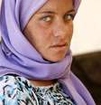 Refugiada yazidi é fotografada em Dohuk; dezenas de mulheres estão sendo escravizadas por jihadistas   Foto: Youssef Boudlal / Reuters