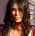 <p>Kim prefere manter a força dos fios com oleosidade natural</p>  Foto: Getty Images 