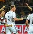 Müller comemora gol da vitória da Alemanha  Foto: John MacDougall / AFP