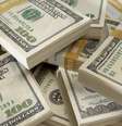 <p>A divisa dos Estados Unidos caiu 1%, a R$ 2,4023 na venda, menor nível de fechamento desde 24 de setembro, quando ficou em R$ 2,3835</p>  Foto: Getty Images 
