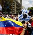 Manifestantes em protesto contra o governo de Nicolás Madura, em Caracas, na Venezuela, no dia 24 de junho deste ano  Foto: Carlos Garcia Rawlins/Reuters