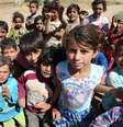 <p>Crianças sírias em um campo de refugiados próximo à cidade de Baalbek, no leste do Líbano</p><p> </p><p> </p>  Foto: Hussein Malla / AP