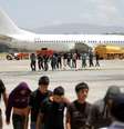 Imigrantes ilegais da Guatemala deportados dos EUA chegam ao aeroporto La Aurora, na Cidade da Guatemala. 10/07/2014  Foto: Pakal Koban / Reuters