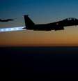<p>Caças F-15E da Força Aérea dos EUA sobrevoam o Iraque após realizar ataques na Síria </p>  Foto: Força Aérea dos EUA / Reuters