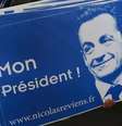 Apoiador segura cartaz a favor da candidatura de Nicolas Sarkozy à presidência  do partido UMP, em Lambersart, norte da França. 25/09/2014.  Foto: Pascal Rossignol / Reuters