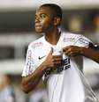 <p>Na avaliação de empresário, Robinho não estaria no Santos caso regra da Fifa estivesse valendo</p>  Foto: Miguel Schincariol / Getty Images 