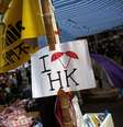 Manifestantes começam a deixar as ruas de Hong Kong nesta terça-feira  Foto: Bobby Yip / Reuters