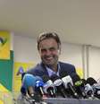 <p>A&eacute;cio Neves conversou com&nbsp;jornalistas em um comit&ecirc; de campanha no Leblon, &aacute;rea nobre do Rio, nesta quinta-feira, 9 de outubro</p>  Foto: Janaina Garcia / Terra