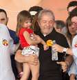 <p>Lula e o governador eleito pelo PT em Minas Gerais, Fernando Pimentel, participam de ato pró-Dilma, em Belo Horizonte</p>  Foto: Alberto Wu / Futura Press