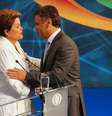 <p>Candidatos durante o debate realizado na TV Bandeirantes</p>  Foto: Paulo Whitaker / Reuters