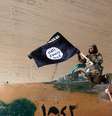 <p>Foto de arquivo de combatente do EI</p>  Foto: AP