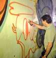 <p>Haddad é apoiador da arte urbana. Na foto prefeito participa de intervenção no túnel José Roberto Melhem</p>  Foto: Reprodução