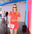 <p>Empresária apostou em saia e top cropped alaranjados para o primeiro dia de SPFW</p>  Foto: Léo Franco / AgNews