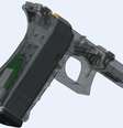Chip da YardArm é mostrado em verde na coronha de uma pistola Glock 9 mm  Foto: MIT / Reprodução