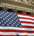<p>Bandeira dos Estados Unidos na Bolsa de Valores de Nova York</p>  Foto: Chip East / Reuters