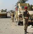 Forças do Iraque fazem segurança contra o Estado Islâmico em Ramadi. 04/12/2014.  Foto: Stringer / Reuters
