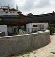 <p>Barco atracou no telhado de uma casa e salvou dezenas de pessoas do tsunami na Indon&eacute;sia</p>  Foto: BBC Mundo / Copyright
