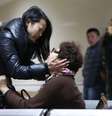 <p>Outras 42 pessoas ficaram feridas no tumulto&nbsp;na&nbsp;Pra&ccedil;a Chen Yi&nbsp;</p>  Foto: Aly Song / Reuters