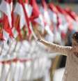 Presidente Dilma Rousseff acena para o público ao chegar no Palácio do Planalto após tomar posse no Congresso, em Brasília. 1/01/2015.  Foto: Ueslei Marcelino / Reuters