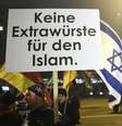 <p>Um homem se manifesta em Berlim contra a "islamização do Ocidente" em um ato do movimento xenófobo Pegida e da sua versão berlinense, Bregida, em 19 de janeiro</p>  Foto: AFP