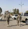 <p>Forças de segurança do Iraque assumem posições para combater militantes do Estado Islâmico, em Adhaim, norte de Bagdá, em novembro</p>  Foto: Stringer / Reuters