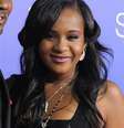 <p>A cantora&nbsp;Whitney Houston, m&atilde;e de Bobbi, morreu em 2012 afogada na banheira de um hotel ap&oacute;s consumir caca&iacute;na</p>  Foto: AP