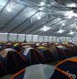 <p>Milhares de pessoas passam a semana inteira dormindo na área de camping do evento</p>  Foto: Jéssica Freitas / Terra