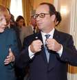 <p>A chanceler alemã, Angela Merkel, e o presidente francês, François Hollande durante encontro em Milão, em 17 de janeiro</p>  Foto: Daniel Dal Zennaro / Reuters