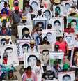 Familiares seguram cartazes de alguns dos 43 estudantes desaparecidos no México, durante protesto em Chilpancingo. 05/02/2015  Foto: Jorge Dan Lopez / Reuters