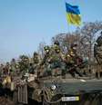 <p>Membros das Forças Armadas da Ucrânia perto de Debaltseve</p>  Foto: Gleb Garanich / Reuters