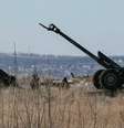 Canhões das Forças Armadas da Ucrânia vistos em posição perto de Debaltseve. 17/02/2015  Foto: Gleb Garanich / Reuters