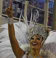Ex-rainha de bateria da Portela, Sheron Menezzes voltou como musa este ano  Foto: Vanderlei Almeida / AFP