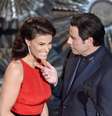 Por que faz isso, John Travolta?   Foto: Kevin Winter / Getty Images 