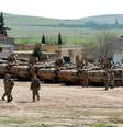 Veículos militares turcos que fizeram parte de operação dentro da Síria, na cidade de Suruc. 23/02/2015  Foto: Stringer / Reuters