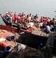 Sobreviventes que foram salvos após a balsa em que estavam naufragar perto do porto de Kyauk Phyu, em Mianmar, neste sábado, 14 de março  Foto: DVB / AP