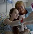 Depois da publicação de vídeo com apelo, a própria presidente Bachelet foi visitar Valentina no hospital  Foto: AP