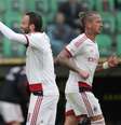Jogadores do Milan comemoram gol de Ménez  Foto: Marcello Paternostro / AFP