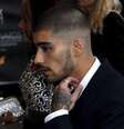 Ex-membro do One Direction Zayn Malik em tapete vermelho de evento em Londres. 17/04/2015  Foto: Cathal McNaughton / Reuters
