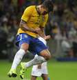 Com gol, Roberto Firmino coloca pressão em Diego Tardelli no ataque do Brasil  Foto: Nabor Goulart / AP