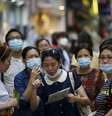 Turistas usam máscaras para prevenir contrair a Mers no centro de Seul, na Coreia do Sul. 12/06/2015  Foto: Kim Hong-Ji / Reuters