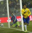 Roberto Firmino fez gol como autêntico centroavante  Foto: Silvia Izquierdo / AP